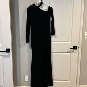 Xscape Cutout Shoulder long sleeve gown in black with nude size 8